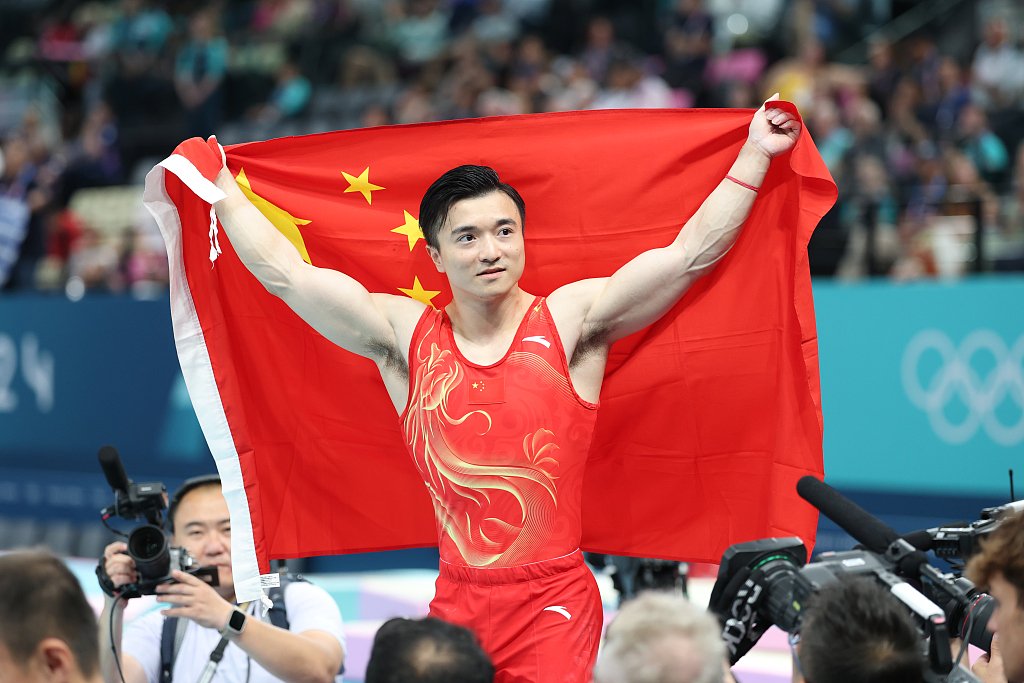 九游体育官网-体操队赛中国队勇夺金牌，霸气称王